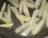 A picture of step 5 of Garlic ketchup fries.
