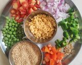 A picture of step 1 of Vegetable Dalia (broken wheat dalia).