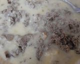 A picture of step 11 of Urad/maash ki khatti daal with bajrey ki roti.