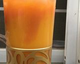 A picture of step 2 of Mango and carrot juice.
