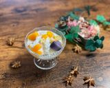 A picture of step 6 of Fruits Coconut Milk with Sweet Sticky Rice.
