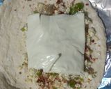 A picture of step 3 of Paneer Stuffed garlic bread.