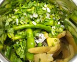 A picture of step 2 of Green Garlic And Fresh Haldi Instant Pickle.