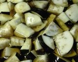 A picture of step 1 of Aaloo Began (Brinjal) Fry.
