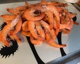 Une image de l'étape 1 de Crevettes sauvages marinées sauce pêche curry au citron et aneth.