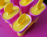 Foto del paso 2 de la receta: Polos de mango y leche de coco con chocolate y pistachos