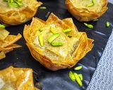 A picture of step 5 of Baklava Muffins 🧡.