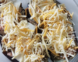 Foto del paso 4 de la receta: Berenjenas rellenas en el micro
