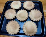 Foto del passaggio 5 della ricetta Bocconotti alla crema di ricotta e limone con amaretti