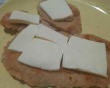 Foto del paso 2 de la receta: Milanesas con queso y salsa acompañadas con puré de papas