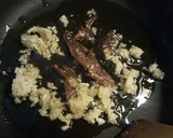 Foto del paso 7 de la receta: Espaguetis con sardinas y migas de pan