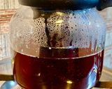 A picture of step 1 of Masala Milk Tea.