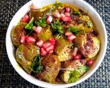 A picture of step 5 of Dahi Baingan with roasted cumins powder.