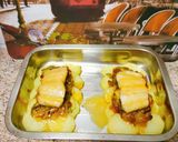 Foto del paso 5 de la receta Bacalao confitado en cama de patatas panaderas
