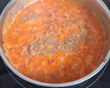 A picture of step 4 of Creamy Tomato Penne with Pork and Basil.