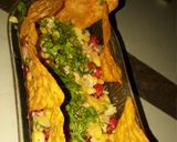 A picture of step 3 of Salsa with nacho chips.