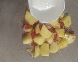 A picture of step 5 of Meethi Alo.