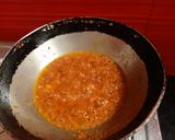 A picture of step 3 of Mashed brinjals with bajra roti baingan ka bartha and bajre ki roti.