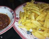 A picture of step 5 of Potatoe chips n onion sauce.