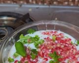 A picture of step 3 of Daki sawal of yesterday rice with fruit ginger, small onion,green chilli and tadka.