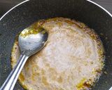 A picture of step 4 of Machher Jhaal / Fish in Mustard curry.
