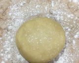 A picture of step 5 of Apple pie with flaky butter crust served with vanilla ice cream.