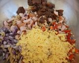 A picture of step 4 of My Smoked Sausage and smoked cheese Pasta.😊.