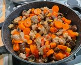 Une image de l'étape 21 de Veau mijoté aux légumes et citron confit.