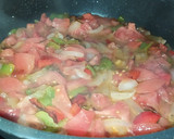 Foto del paso 2 de la receta: Arroz con anillas, langostinos y almejas