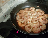 Foto del paso 9 de la receta: Arroz caldoso de bogavantes y langostinos al whisky con coquinas al ajillo