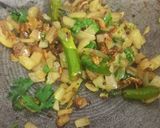 A picture of step 2 of Aloo Matar.