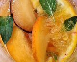 A picture of step 2 of Orange, Nectarine, Plum, and White Wine Sangria.