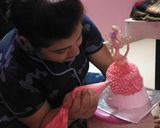 A picture of step 6 of Barbie doll cake.