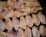 Foto del paso 4 de la receta: Alitas y patitas de pollo a la sidra
