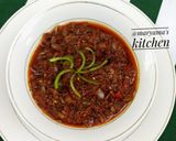 A picture of step 14 of Nigerian carrot fried rice with minced meat soup.