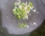A picture of step 11 of Spicy BBQ chicken ricewith stir fry vegetables.
