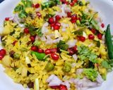 A picture of step 4 of Poha with Potatoes Peas and Pomegranate.