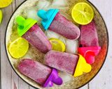 A picture of step 4 of Blueberry Banana Smoothie ice popsicles 💜💜.
