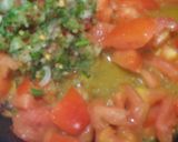 A picture of step 4 of Maggi in a cheesy tomato sausage.