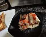 A picture of step 3 of Nuetella and banana french toast roll ups.