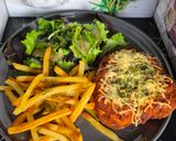 Une image de l'étape 8 de Escalopes de poulet gratinées à la bolognaise et à la mozzarella.