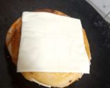 A picture of step 4 of Cheese Burst Pizza Sandwich.