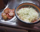 Foto del paso 5 de la receta: Empanizado de pollo en ensalada de col y tomates