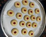 A picture of step 3 of Thumb Print Jam Cookies with White Butter.