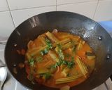 A picture of step 5 of Drumstick, rawmango pulusu.