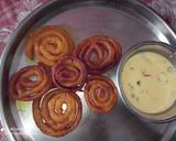A picture of step 9 of Jalebi with rabdi milk.