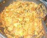 A picture of step 1 of American chop suey with fried rice.
