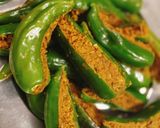 A picture of step 3 of Dana Methi stuffed Mirchi.