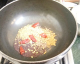 A picture of step 3 of Pomengranate Pickle.