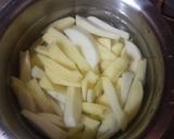 A picture of step 1 of Garlic Potato Wedges.